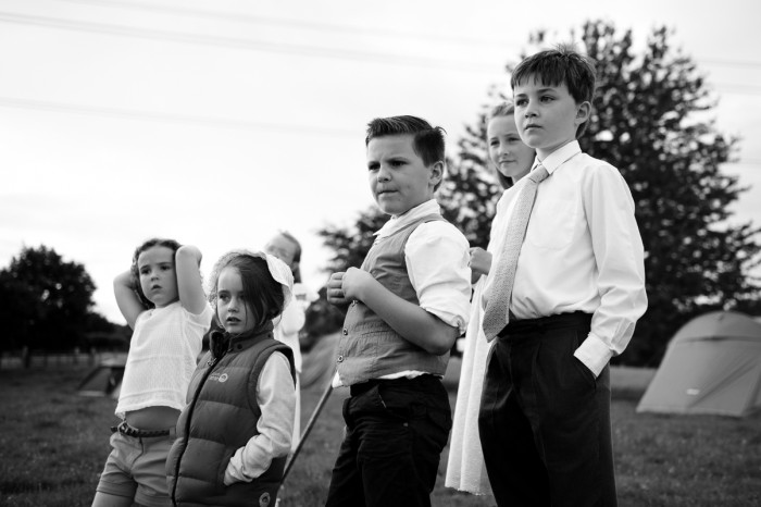 Cinematic picture of group of kids at wedding