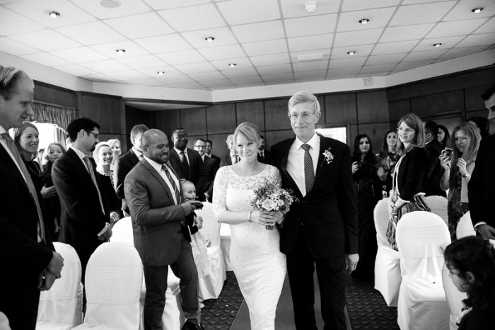 Bride and father walk down the aisle at Deans Place wedding