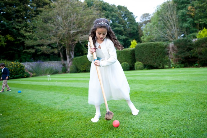 Girl playing lawn games at Deans Place wedding