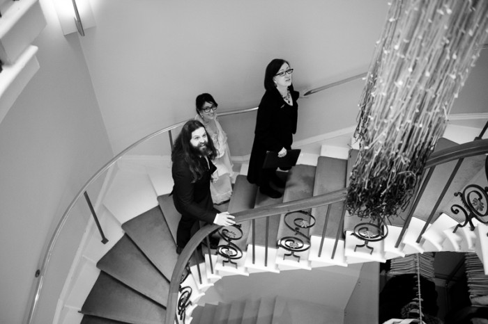 Bride and groom on Asia House staircase