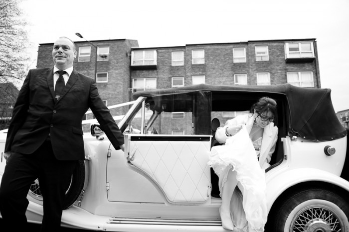 Bride arriving at St Johns Wood wedding in vintage car