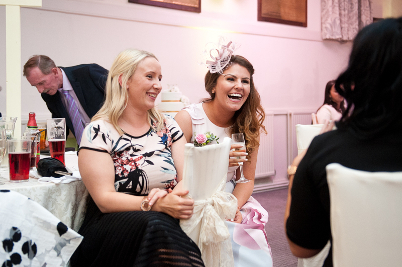 Guests laughing at wedding at Kings Chapel