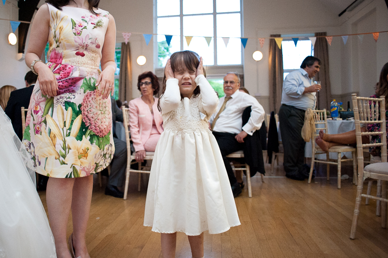 Girl on dancefloor at Greek Orthodox wedding