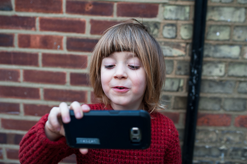Child taking selfie