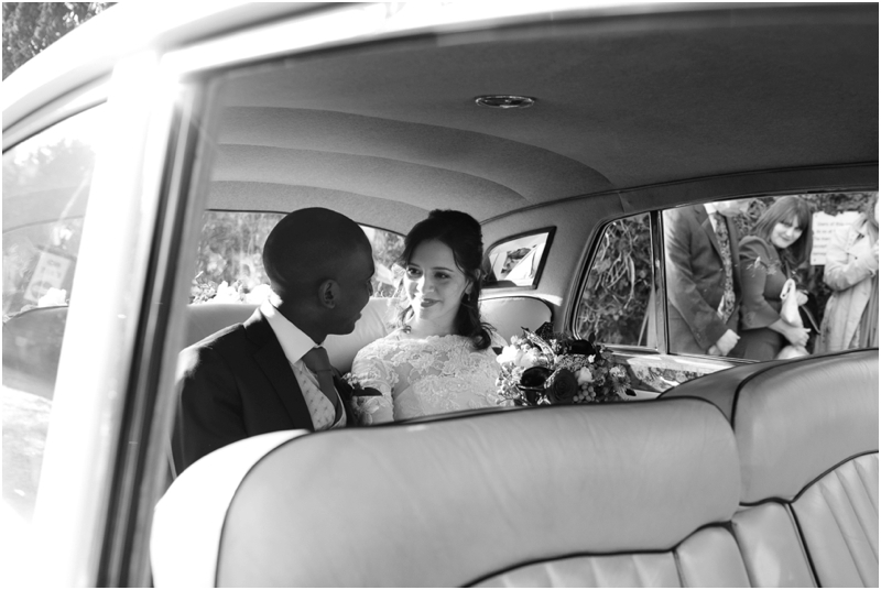 Bride and groom in Rolls Royce at Hatfield House wedding, Annelie Eddy Photography