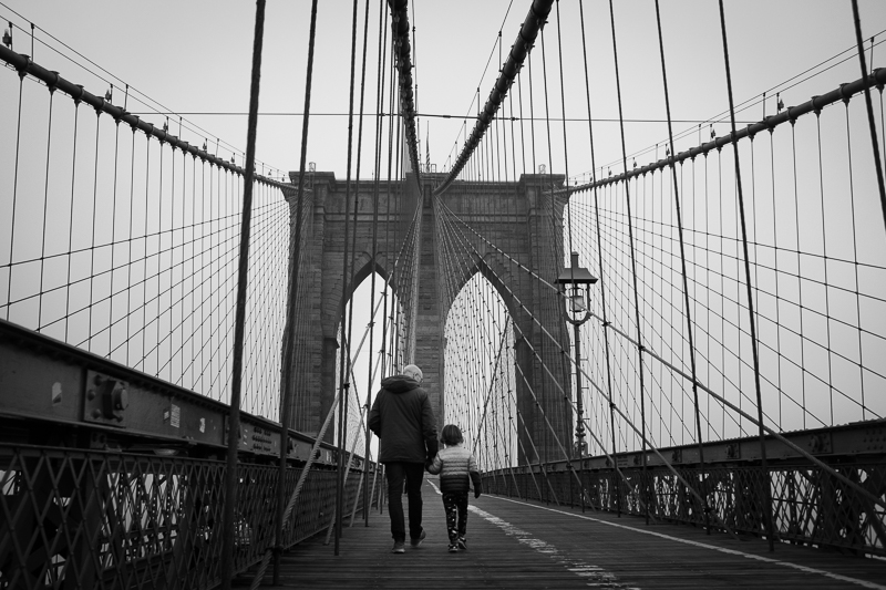 Father and son on Brooklyn Bridge