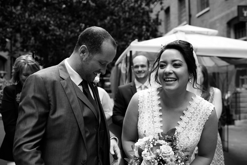 Bride and groom laughing at Devonshire Terrace wedding