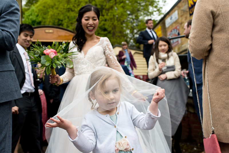 Bride with flower girl at Fawley Hill