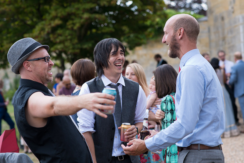 Guests mingling at Chiddingstone Castle wedding
