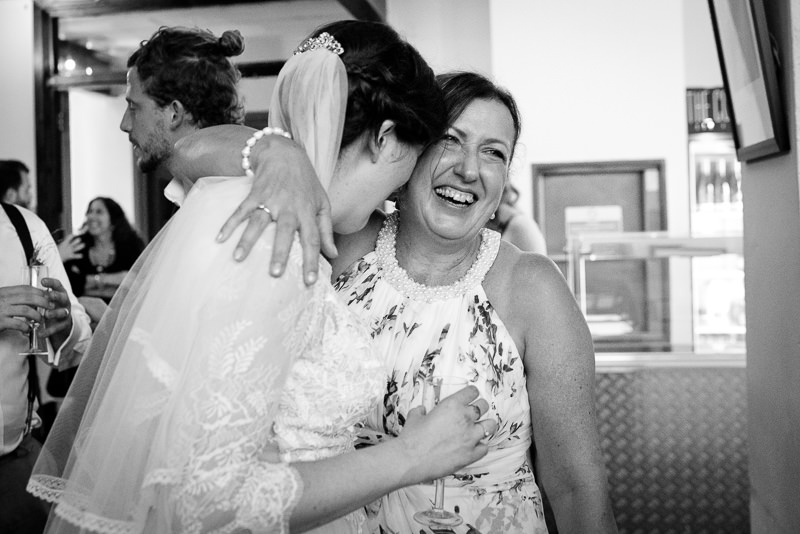 Candid wedding photos of bride with aunt at Holburn Studios wedding