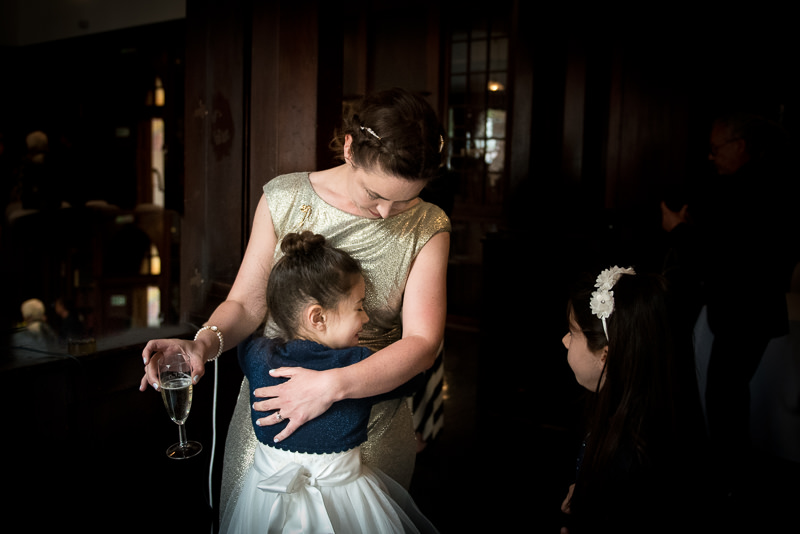 Bride hugs daughter at Mary Ward House wedding