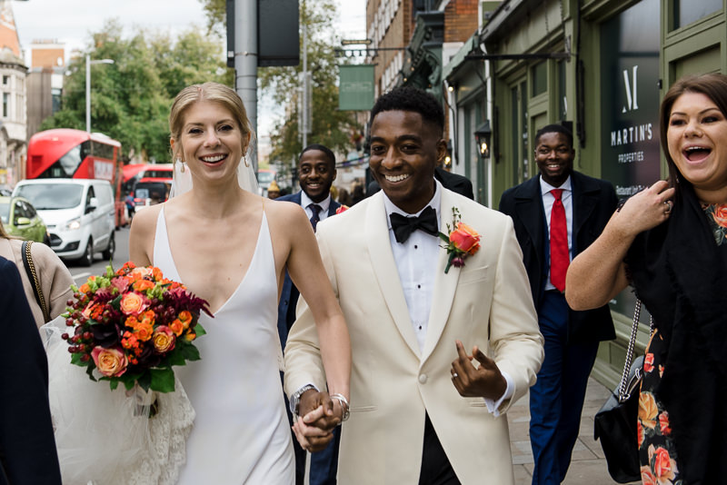 Bride and groom after Chelsea Town Hall wedding