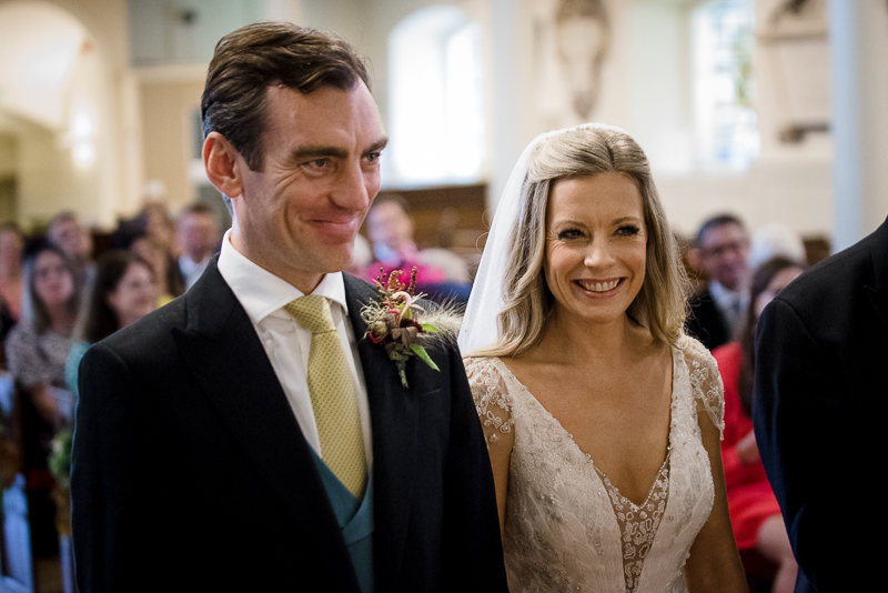 Bride and groom during wedding ceremony at St Mary's Church Battersea