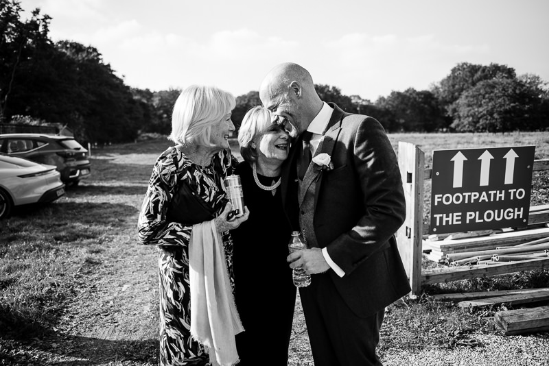 Groom greets Mum at Rectory Farm wedding