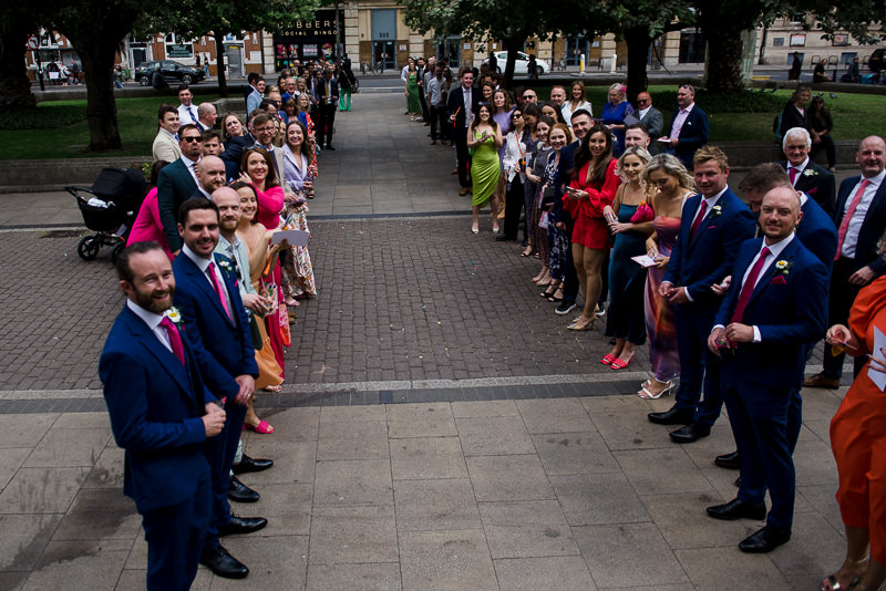 Guests get ready to throw confetti outside Hackney Town Hall
