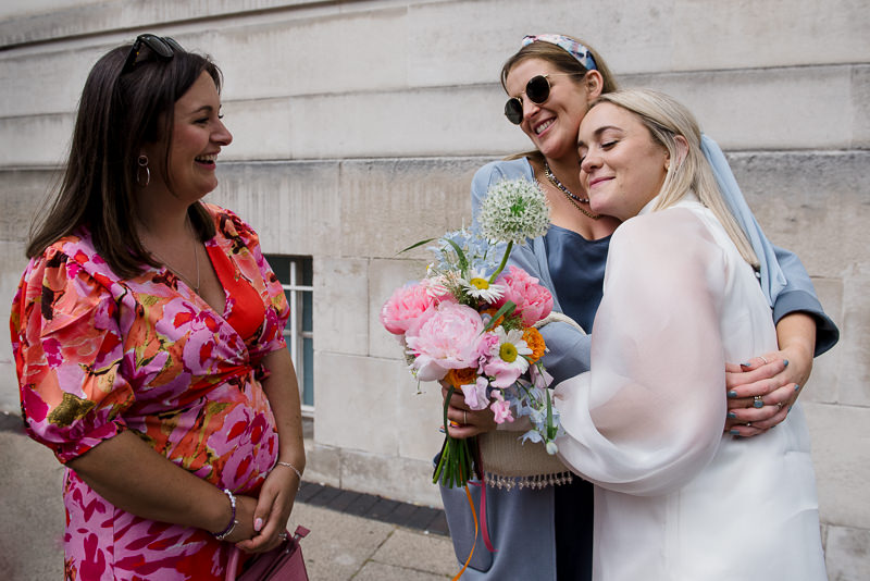Bride with best friends at East London wedding